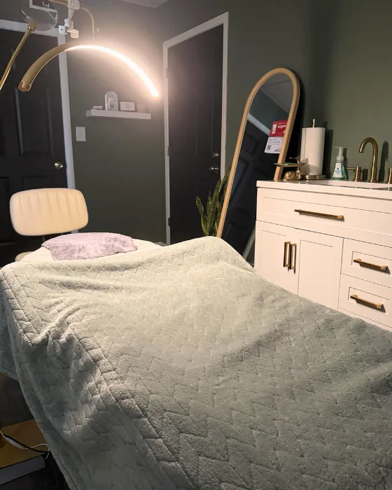 Relaxing facial treatment room with warm neutral tones
